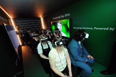 Partners wear virtual reality headsets inside the Flying Spedan